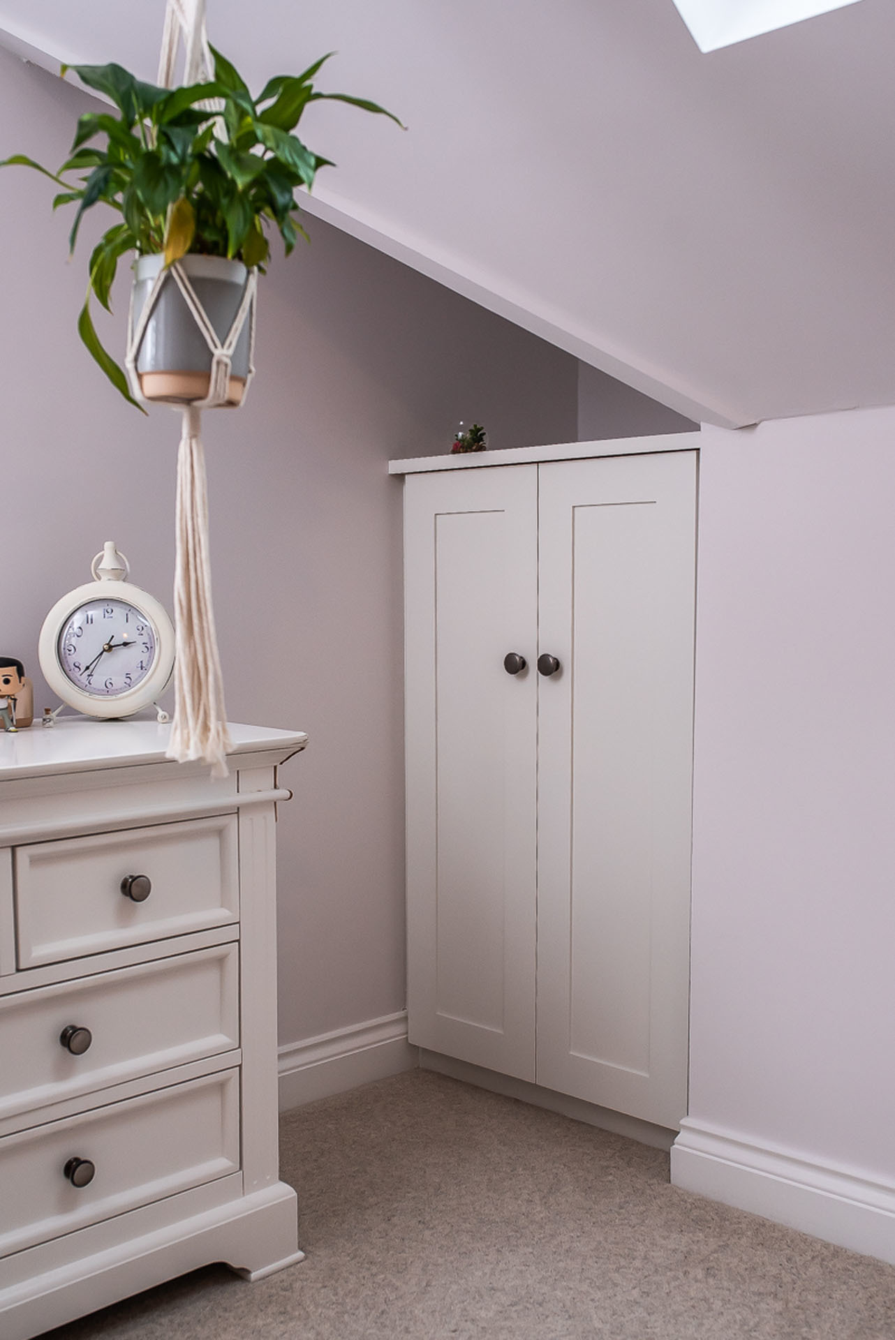 white cabinet with shaker style doors in loft room hertfordshire