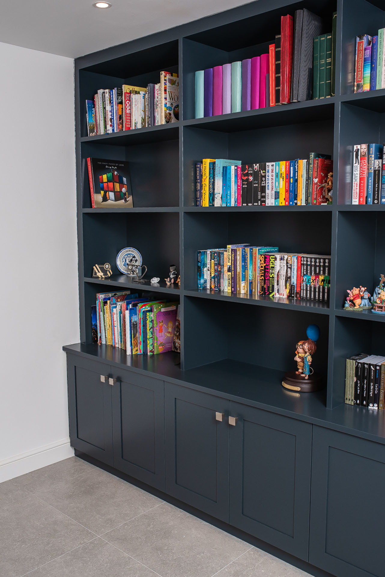 blue bookcase with shaker style doors in Abotts Langley Hertfordshire