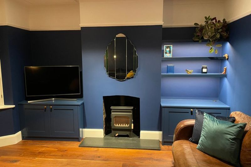 blue alcove units and shelving in hertfordshire home